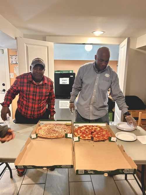 Recovery Cafe DC members sharing a meal together